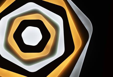 LED lamp with multi-colored glow on a black background. LED lighting in the interior.