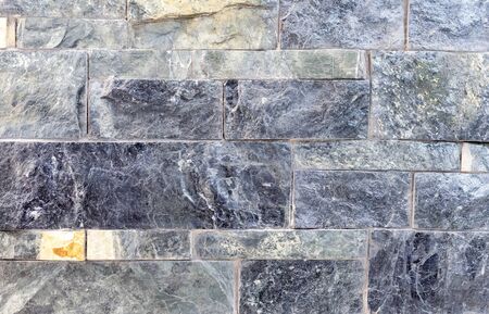 Blocks from a natural finishing stone. Quartz stone texture for room decor. Background of rough...