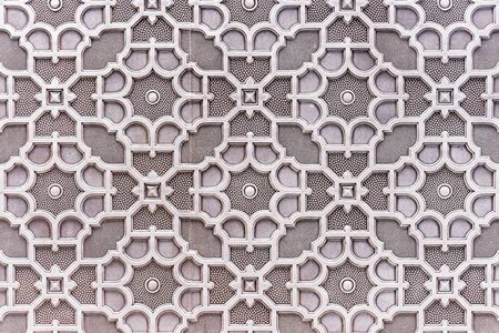 Metal wall panel with 3D ornament. Background with volumetric oriental pattern.