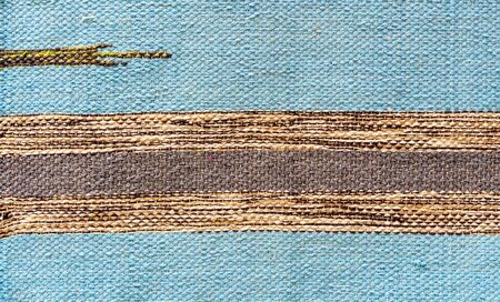 Rug of pieces of cloth. Texture and background of patchwork carpet.の写真素材