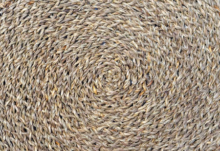 Wicker texture. Background of reed weaving. Rough weaving from straw.の写真素材