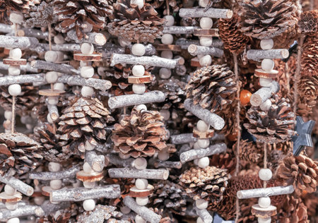 Christmas garland of pine cones, wood cuts and twigs.の写真素材