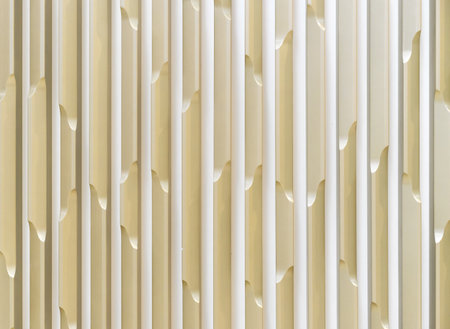 Yellow plastic wall panel with 3D effect. Background with a three-dimensional pattern.の写真素材