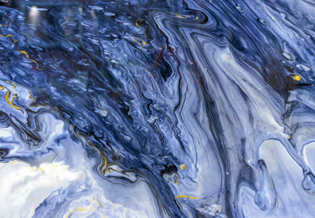 Blue quartz with yellow and white inlays. Natural quartz background and texture.の写真素材