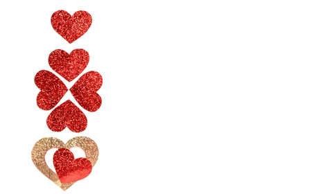 Pattern of red and gold hearts on a white background. Valentine's day concept.の写真素材