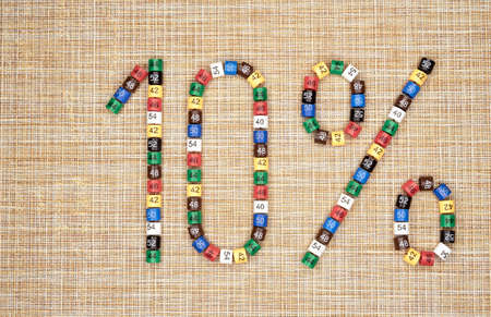 Ten percent off discount sign made of plastic clothing size tags. The concept of discounts and promotions.の写真素材