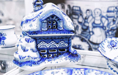 Porcelain rustic hut made in Russian Gzhel style.