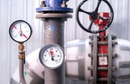 Manometer for measuring water pressure. Gas boiler house equipment.の写真素材