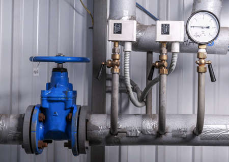 Gate valve, sensors and alarm in the gas boiler house.の写真素材