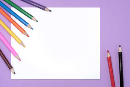 White frame with colored pencils for drawing. Background with pencils.の写真素材