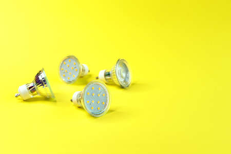 LED energy saving lamps GU10 on a yellow background.の写真素材