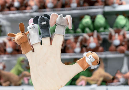 Finger toys in the form of various animals in a toy store.の写真素材