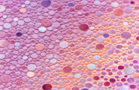 Lilac-yellow ceramic tiles with multi-colored ovals.の写真素材