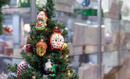 Glass Christmas tree toys on a small Christmas tree.の写真素材