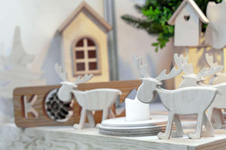 Christmas deer are carved from wood. Christmas concept.の写真素材