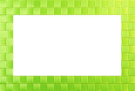 Frame with green wicker ribbon and white middle.の写真素材