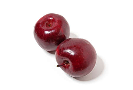 Two red apples isolated on white. Fresh apples.の写真素材