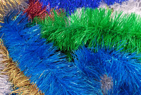 Multicolored Christmas tinsel. Tinsel for Christmas decor.の写真素材