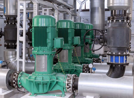 Engines and network pumps on the pipeline in the gas boiler room.の写真素材
