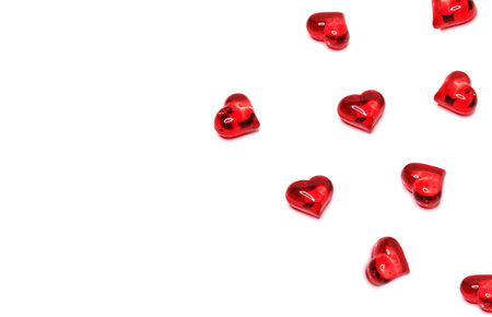 Red glass hearts on a white background. Valentine's day concept.の写真素材