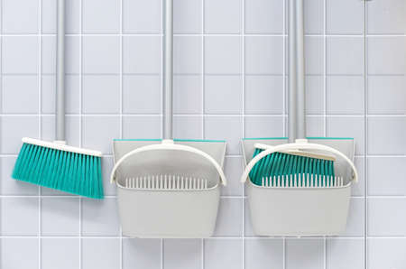 Plastic broom and dustpan for cleaning the house.の写真素材