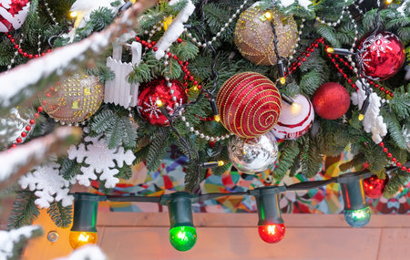 Christmas tree decorated with Christmas balls, snowflakes and garlands.の写真素材