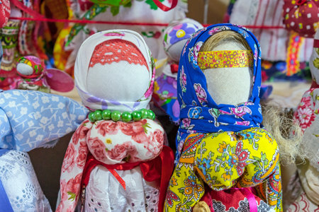 Traditional rag dolls in national Russian costumes. Slavic dolls. Guardian dolls.の写真素材