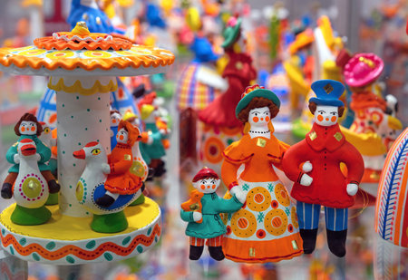 Clay figurines of people in bright clothes. Dymkovo toy.の写真素材