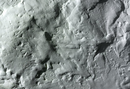 White wall background with shadow and rough plaster. Background for design and decoration.の写真素材