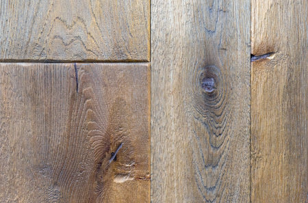 Texture of natural wood with knots and cracks.の写真素材