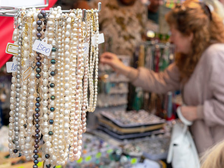 Beads and necklaces made of natural pearls and mother-of-pearl in a street shop of oriental jewelry.の写真素材