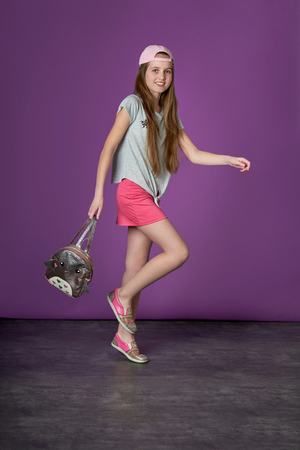 Sporty pretty teen girl loves sports.childrens sports fashion.の写真素材