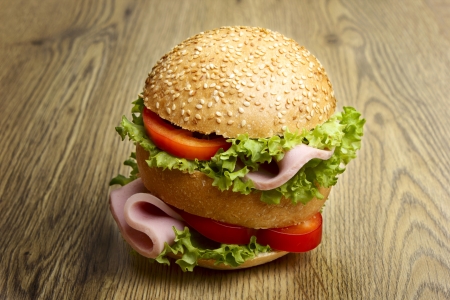 Hamburger on wooden tableの写真素材