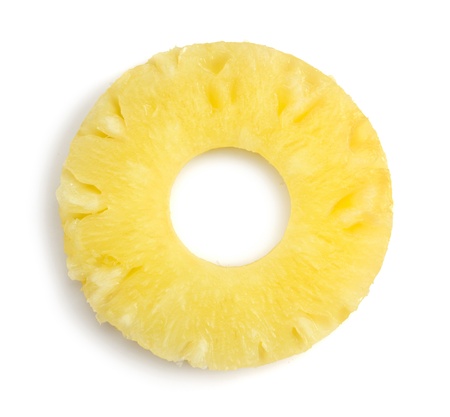 Slice of pineapple isolated on whiteの写真素材
