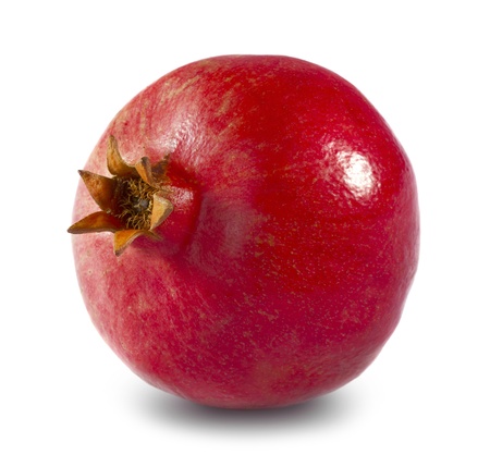 Whole pomegranate isolated on whiteの写真素材