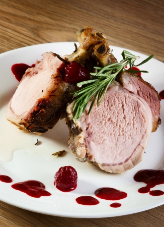 Meat with sauce on white plateの写真素材
