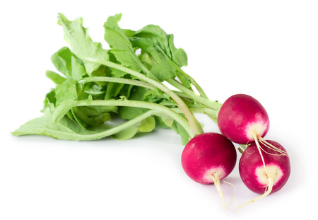 Three fresh radishes isolated on white backgroundの写真素材