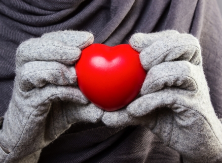 Red heart in woman handsの写真素材