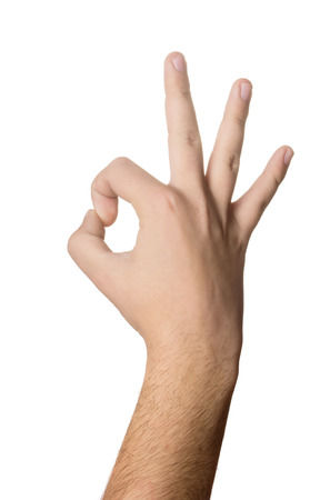 Hand OK sign isolated on white backgroundの写真素材