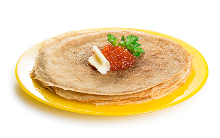 Pancakes with red caviar isolated on white backgroundの写真素材