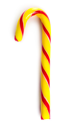 Sweet stick candy cane isolated on white backgroundの写真素材