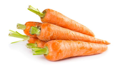 Fresh raw carrots isolated on white backgroundの写真素材
