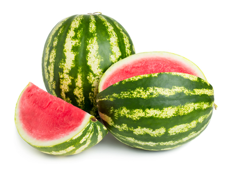 Close up view of whole and sliced watermelons on white backgroundの写真素材