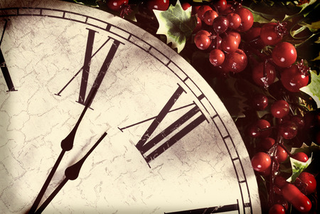 Old wooden clock and Christmas decorations. New year conceptの写真素材