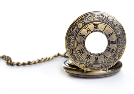 Old pocket watch isolated over white background