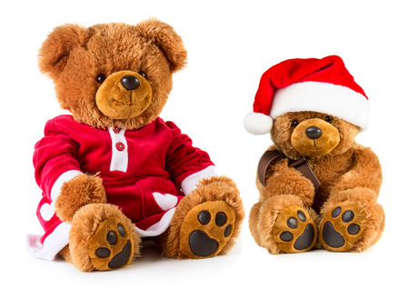 Teddy bears wearing a Christmas clothes isolated on white background. Mother and sonの写真素材