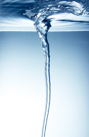 Whirlpool underwater in blueの写真素材