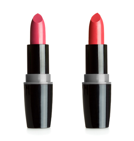 Close up view of two lipsticks isolated on white backgroundの写真素材