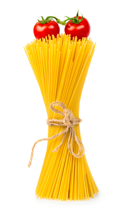 Raw spaghetti with cherry tomatoes and basil leaf isolated on white backgroundの写真素材