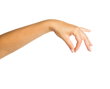 Beautiful woman hand with manicure isolated on white backgroundの写真素材